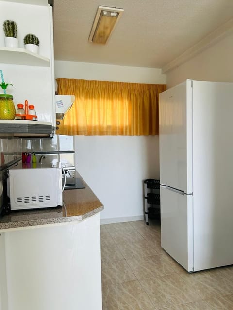 Fridge, microwave, coffee/tea maker, toaster