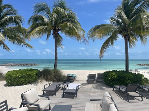 On the beach, sun loungers, beach towels