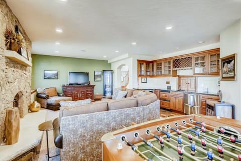 Living area with wet bar, and foosball table