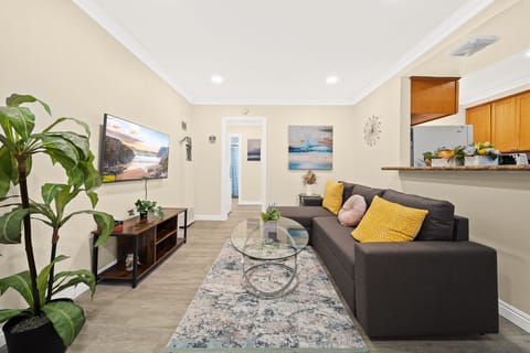 Relaxation takes center stage amidst elegant furnishings and a warm ambiance.