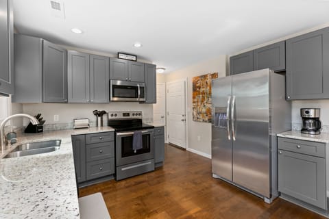 Full suite of appliances in the kitchen.