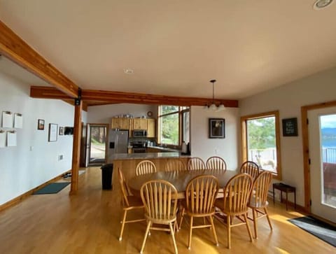 big dining table and seating at counter