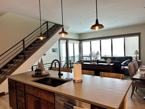 Looking out from kitchen Island on a snowy day.