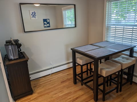 Dining room with 4 place table and coffee bar