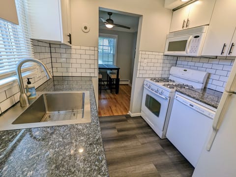 Fully stocked kitchen with all the necessary utensils and cooking supplies