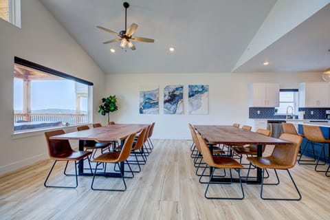 Two live edge dining tables seat 16, plus 5 more at the bar and two high chairs