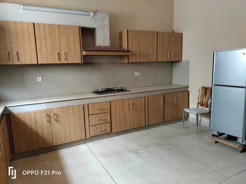 Fridge, oven, dining tables