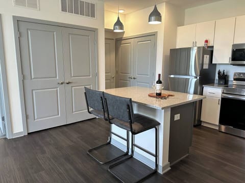 Clean, modern, and comfortable - perfect for cooking or just relaxing with new friends