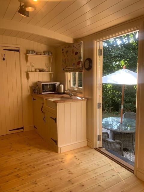 With garden furniture & BBQ