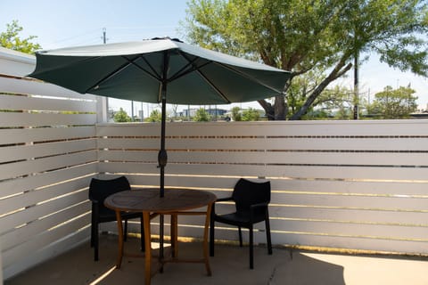 Private patio with chairs/table