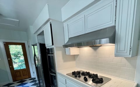 Kitchen Ovens and Gas Burner Cooking Area