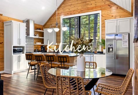 The heart of the home beats in this kitchen, a blend of rustic charm and modern amenities.