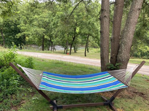 Have a nap across from the river in the hammock.