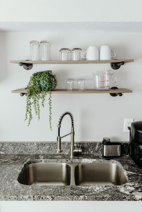 Kitchen sink provided for washing hands and food preparation