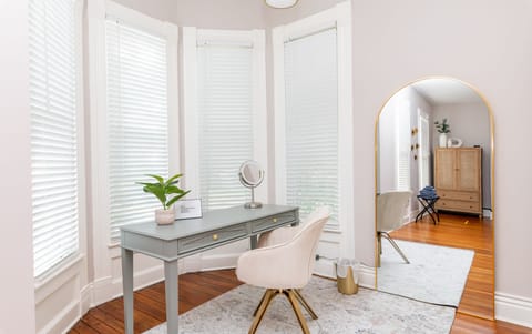 Primary has its own nook with desk perfect for work or vanity for getting ready for a night on the town