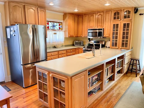 Fridge, microwave, dishwasher, dining tables