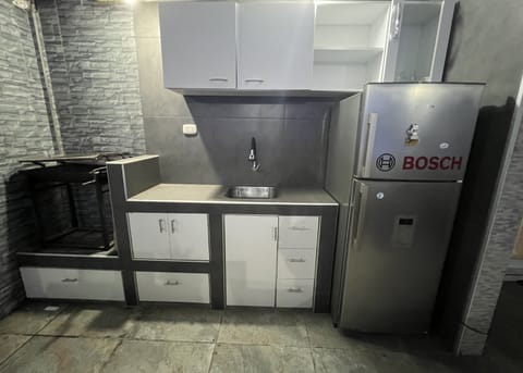 Fridge, dishwasher, coffee/tea maker, electric kettle