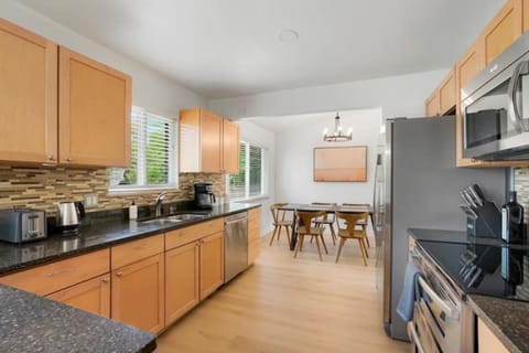 Open concept style view room kitchen towards dinning room
