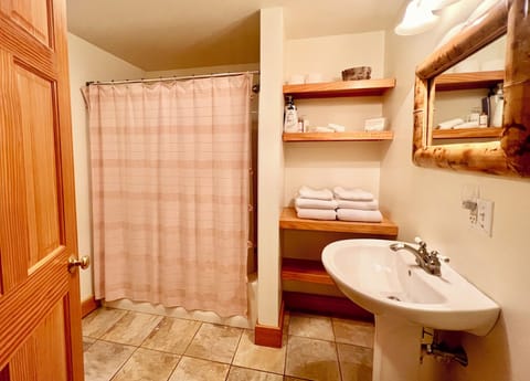 Jetted tub, hair dryer, towels, soap