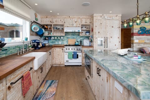 That`s no pantry, it`s a custom paneled refrigerator.