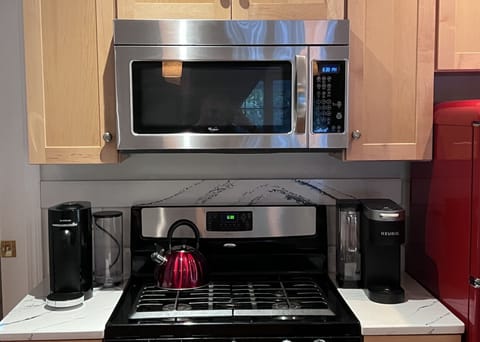 Fridge, microwave, stovetop, coffee/tea maker