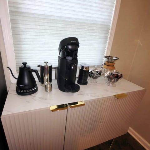 Your personal coffee bar—sleek, stylish, and ready for your morning ritual. Equipped with top-tier espresso makers, a variety of brews, and all the fixings, it’s the perfect spot to start your Cleveland mornings with a jolt of flavor.