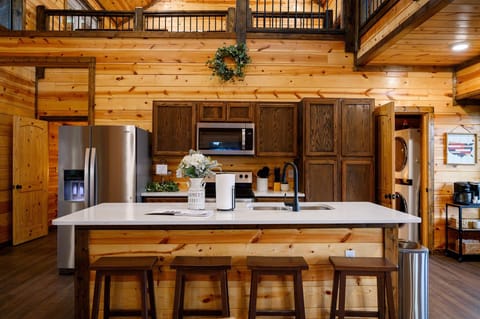 Additional seating can be found in the kitchen