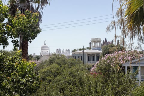 View from the porch - Bishop's Palace, the Widow's Walk, and Sacred Heart church