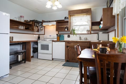 Newly Remodeled Kitchen with full size fridge, dishwasher, and basic cookware. Plenty of storage for coolers and food.