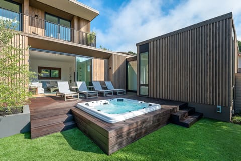 Welcome to our large hot tub at The Courtyard House...Private and heavenly.