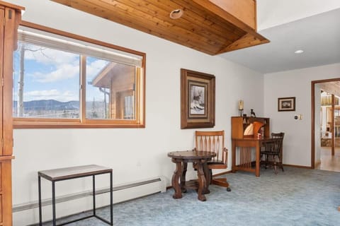 The workspace in the master bedroom features a desk and chair great for any remote work needs.