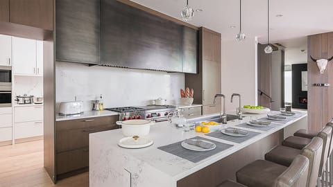 Gourmet kitchen on main level with bar seating