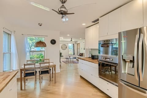 A bright, inviting kitchen & Dining ready for all your culinary adventures.