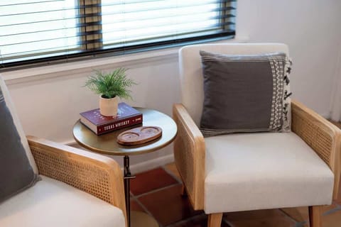 Step into comfort as you enter our establishment, where a charming sitting area awaits, providing a welcoming space to gather and enjoy the ambiance.