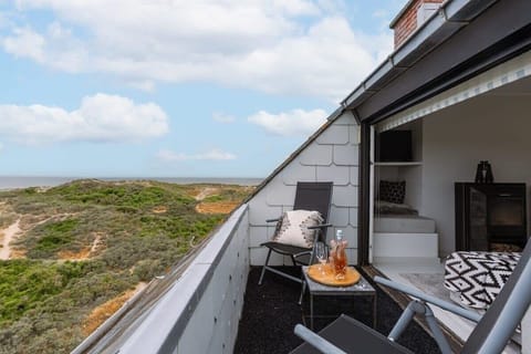 Cozy terrace with beautiful views of the dunes and the sea