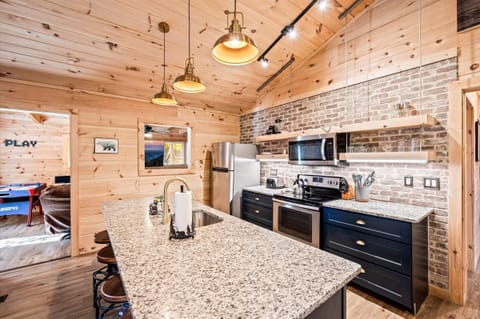 Cook in style with stainless steel appliances and granite countertops.
