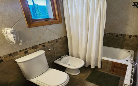 Shower, eco-friendly toiletries, hair dryer, towels