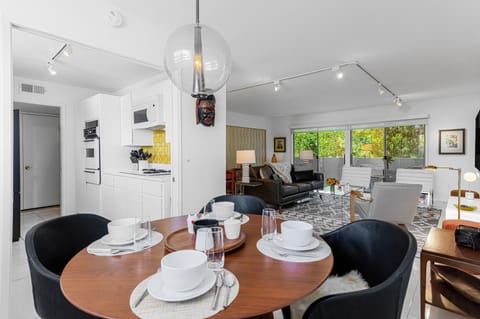 View of living room, dining area and kitchen