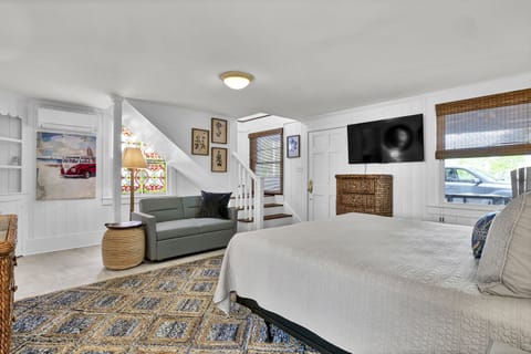The downstairs boasts a large king bedroom and pull out Twin