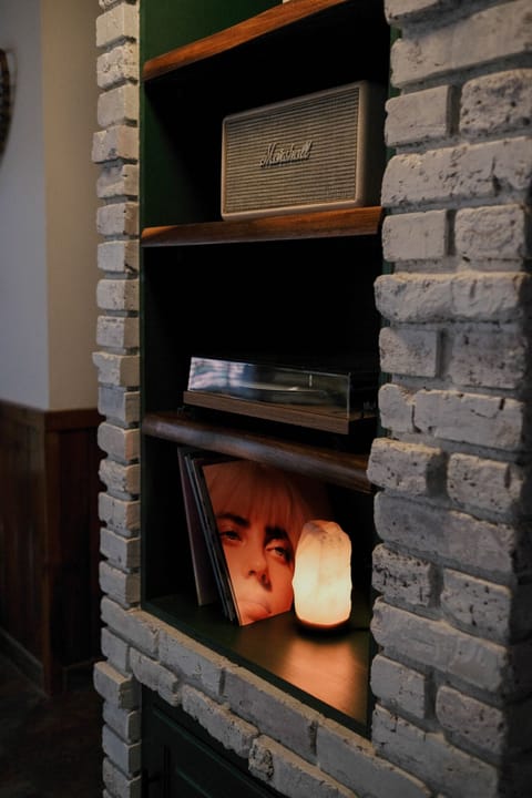 Custom built entertainment area w/ Marshall Stanmore, turntable, records