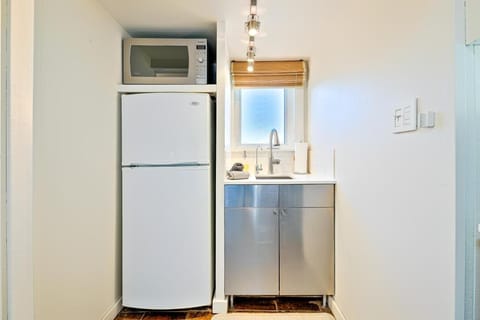 Fridge, microwave, coffee/tea maker, toaster