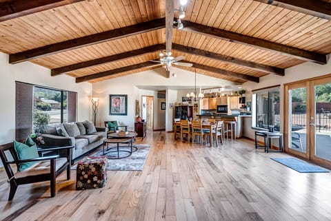 Spacious Living Room with Plenty of Comfortable seating and Smart TV