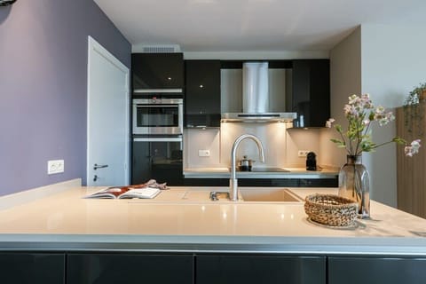 Black kitchen with all amenities