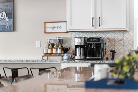 Enjoy some custom morning brews from the Phillips LatteGo coffee and espresso maker with ground and whole bean coffee and flavors provided.