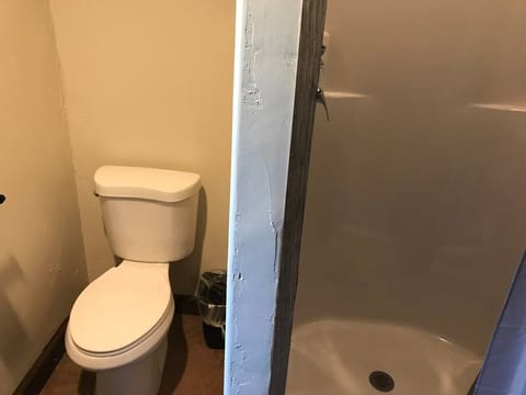 Bathrooms in grain bin bath house are sometimes shared with as many as 8 other people