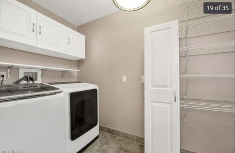 laundry room with washer and dryer