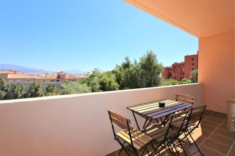 Another view of the balcony with dining area for six guests