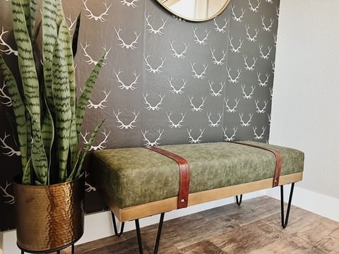 Be greeted by the front entryway with bench and large closet (on other side)