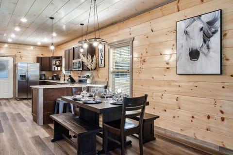 Imagine sharing delicious meals and laughter with loved ones in this cozy setting.