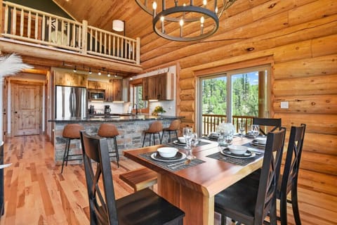 Dining Room Table that Seats 6-7 and 4 Barstools in Kitchen.